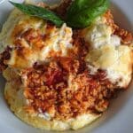 Reis Hackfleisch Auflauf mit geschmolzenem Käse Rezept