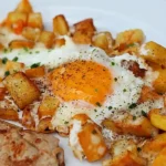 Bratkartoffeln mit Ei und Käse Rezept