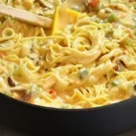 Spaghetti in Käse-Sahnesoße mit Schinken & Pilzen Rezept