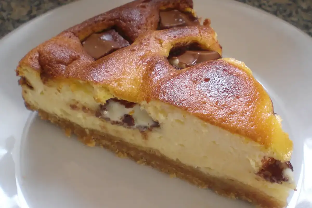 Käsekuchen mit kinderriegel und vanillepudding Rezept