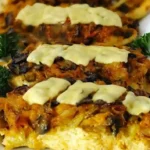 Überbackene Hähnchenbrustfilets mit Gemüsedecke Rezept