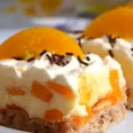 Nusskuchen mit Pfirsichcreme Rezept