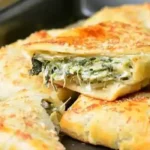 Blätterteig Dreiecke mit Spinat und Feta Rezept